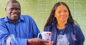 Dr. Emong Paul, Senior Lecturer and Head of the Disability Resource Unit at Kyambogo University, hands over a beautifully crafted cap to Jacy, a symbol of African people's warm and special welcome.