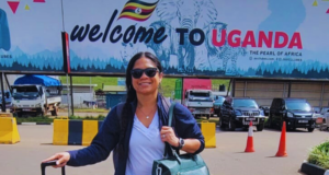 Jacy Farkas Poses at Entebbe International Airport Following Her Arrival in Uganda